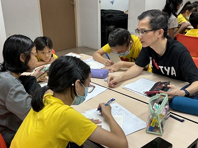 Boon Teck coaching students2_lowres